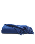 front view of navy cashmere fringe throw blanket on white background