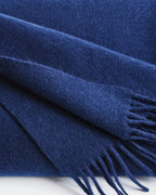 close-up detail of navy cashmere fringe throw by Home of Cashmere